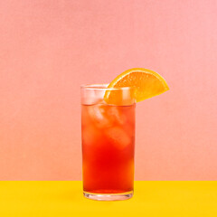 Classic Negroni Sbagliato with Orange Slice on Bold Background