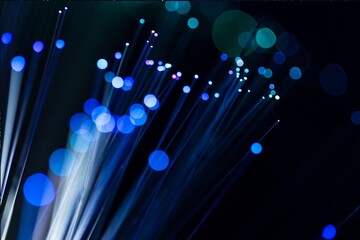 blue fiber optic background, abstract background, fiber optic fiber connecting communication...