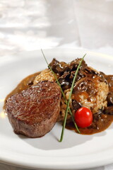 Tall Filet Mignon with dry mushroom risotto