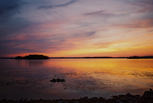 Colourful awe-inspiring sunset over the lake 