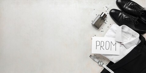 Male shirt, shoes, perfume, watch and text PROM on light background with space for text, top view © Pixel-Shot