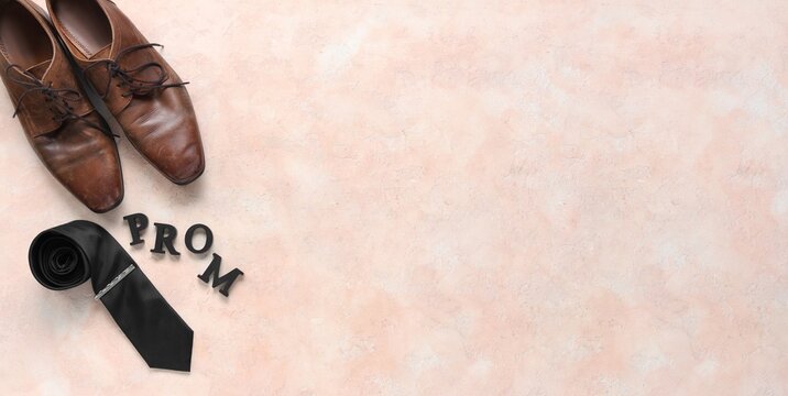 Word PROM, necktie and shoes on beige background with space for text, top view - Powered by Adobe