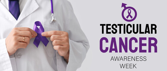 Male doctor with blue ribbon on light background, closeup. Prostate cancer awareness concept