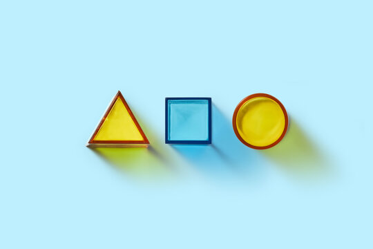 Geometric arrangement of triangle, circle and square in studio