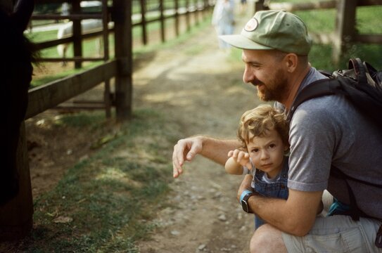 Father And Son Spending Time On The Farm