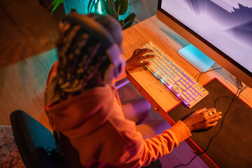 Anonymous woman enjoying video games