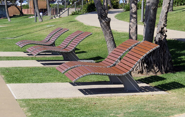 Group of curved wooden seats at Yeppoon in Queensland, Australia