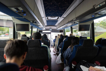 Tourists traveling on a bus in Washington D.C. Enjoying their trip