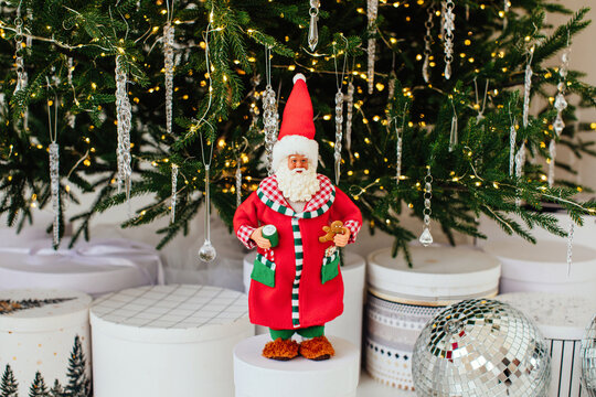 Santa near Christmas tree