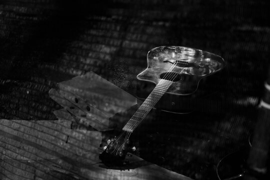 Acoustic guitar in black and white - Powered by Adobe