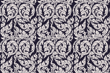Seamless traditional Thai art bold white colored floral arabesque pattern in damask style motifs suitable for wallpaper,  cloth, textile, tile and fabric design isolated over blue background.