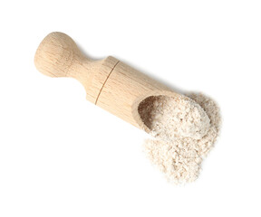 Scoop with brown rice flour isolated on white, top view