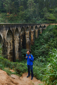 Man near Nine Arch Bridge in Sri Lanka