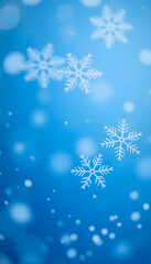 blue christmas background with snowflakes, close-up. with white shades