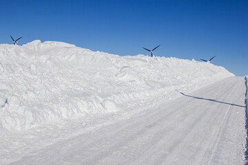 deep snow drifts along a rural Minnesota road