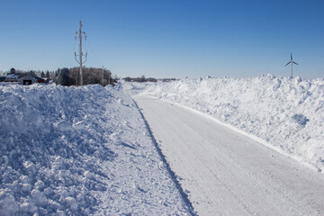 deep snow drifts along a rural Minnesota road