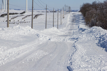 deep snow drifts along a rural Minnesota road