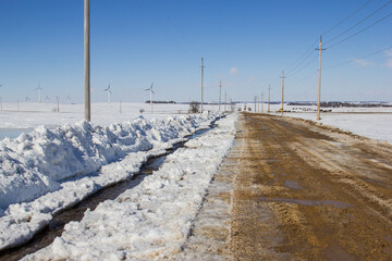 water running down the road ditch during the spring thaw