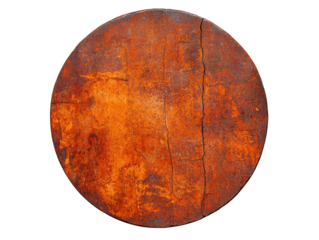 A circular object displaying a textured, rusty surface with visible cracks and deep orange tones.