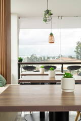 A sleek, modern coffee shop with a stylish and aesthetic design, offering a cozy and trendy atmosphere for enjoying coffee.

