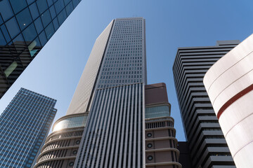 Skyscrapers close up view in blue sky