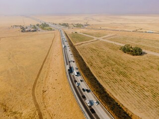 Aerial view of vehicles traveling on  Interstate 5 highway, Grapevine, California, USA. through...