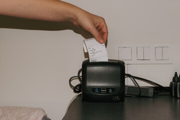 Receipt printing in a small cafe on a busy day