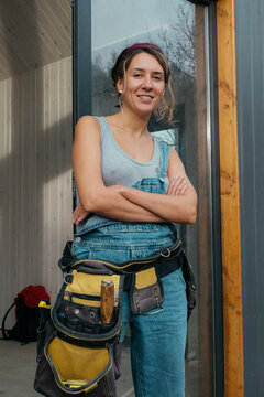 Builder in overalls ready for construction repairs