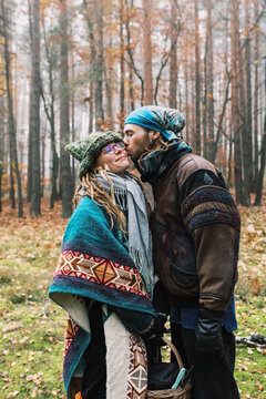 Bohemian-Inspired Couple in Foggy Field with Basket
