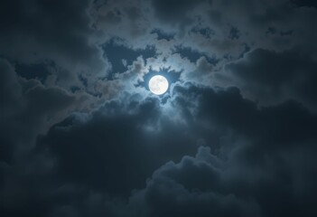 Full Moon Illuminating Dramatic Clouds in Night Sky