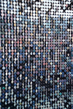 Facade wall made of reflective metallic sequins
