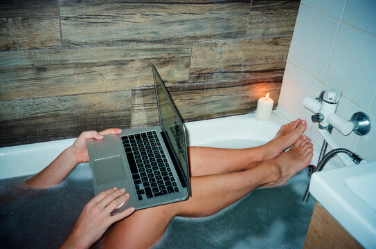 Relaxing time in hot bathtub with candlelight