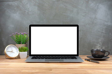 Fototapeta premium Laptop with blank screen on table