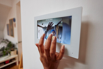 Answering the intercom at home