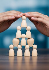 Leadership structure protected by careful hands.