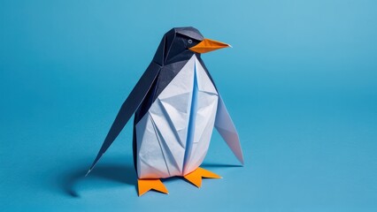  a charming origami penguin stands proudly against a blue background