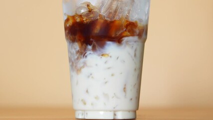 Close-up Front view Freshly brewed coffee mixed with milk.