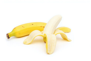 bunch of bananas sitting on top of white surface