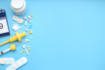 calendar tampons and other items on blue surface