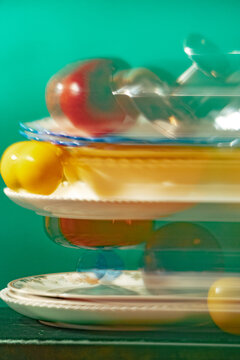 Colorful fruit display on trays against a bright background