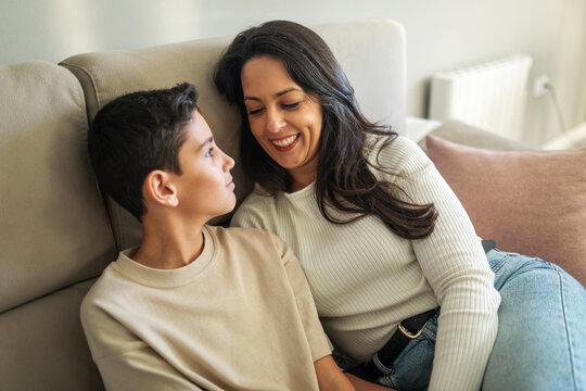 mother with her preteen son at home