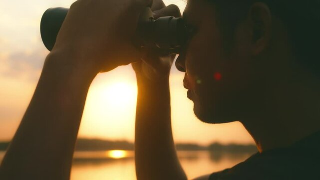 man use the binoculars.Concept perspective for future planning vision for success ideas.