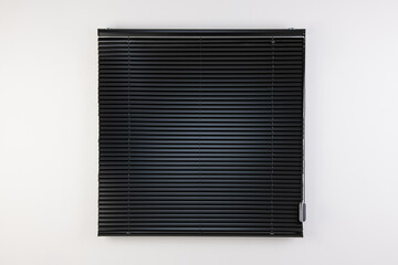 Black blinds isolated on white background with clipping path. Top view.