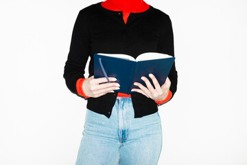 Person holding a blue notebook in business office with hard flashlight