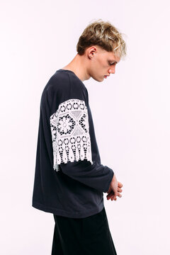 Young man modeling a stylish long-sleeve shirt