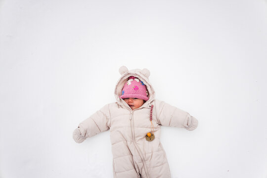 Portrait of a baby in the snow
