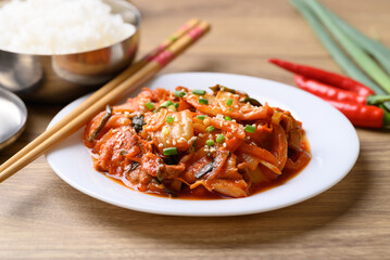 Stir fried kimchi cabbage with pork eating with cooked rice, Korean food
