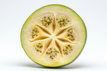 Half of ash gourd in studio close up shot on white background showcasing organic textures and edible seeds