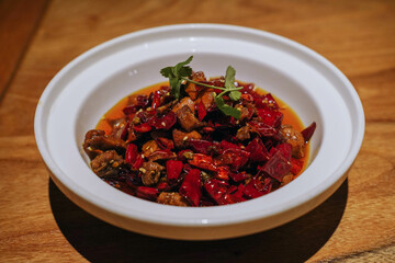 Cold rabbit is a famous cold dish in Sichuan cuisine. It is made from rabbit meat, which is marinated in a mixture of spices and sauces and then boided.