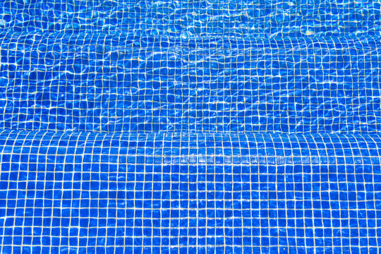 Deep Blue Mosaic Tiles In Swimming Pool